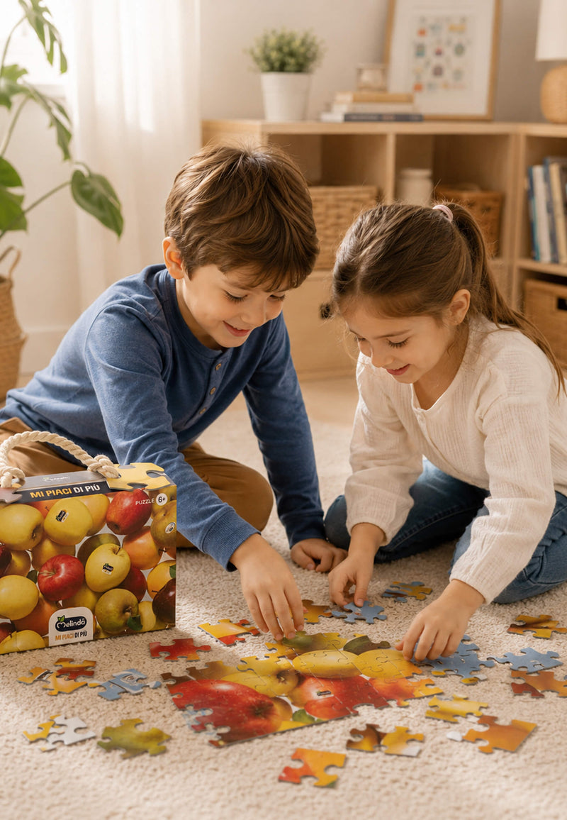 Puzzle Melinda, con illustrazione delle mele, insieme agli accessori