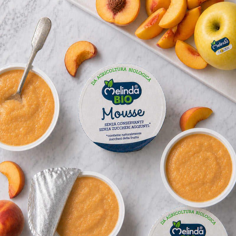 Mousse BIO Melinda gusto pesca servita con frutta fresca